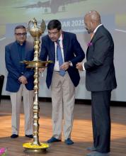 The Secretary of Ministry of Civil Aviation, Shri Samir Kumar Sinha lighting the lamp at the Safety Seminar 2025